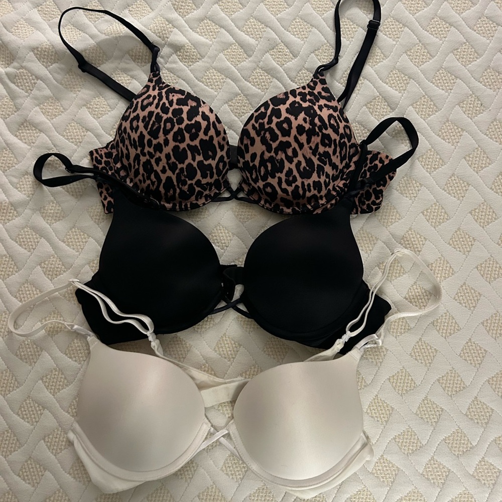 Victoria's Secret Bombshell Leopard, Black, and White Bra Trio